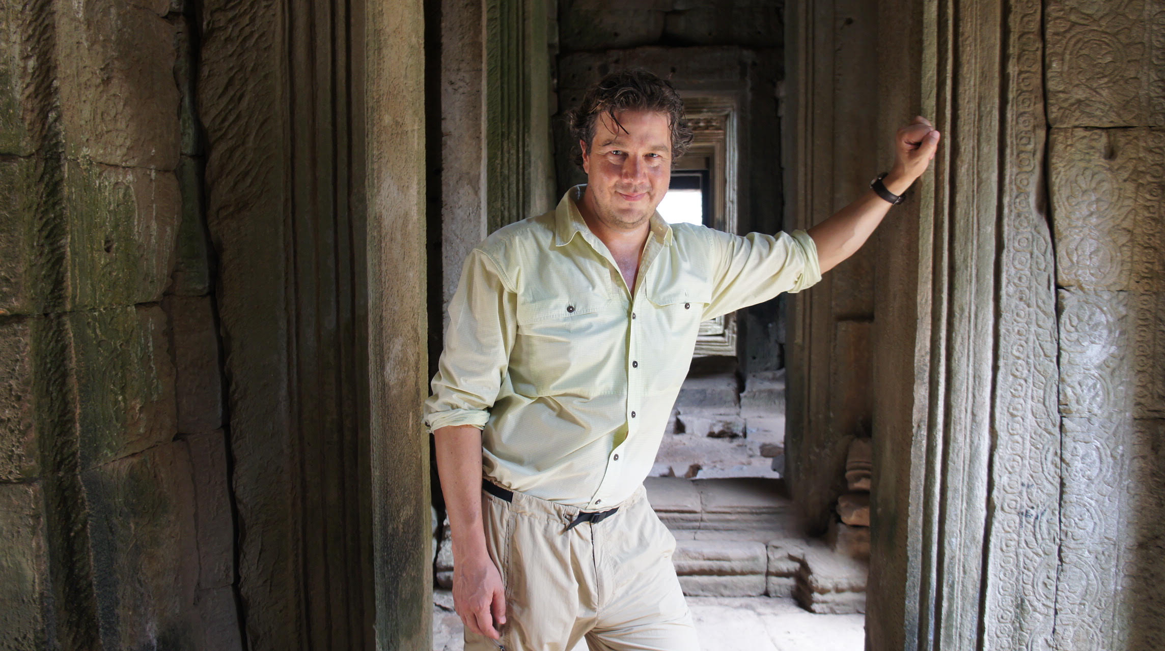Christopher Baugh in a temple corridor